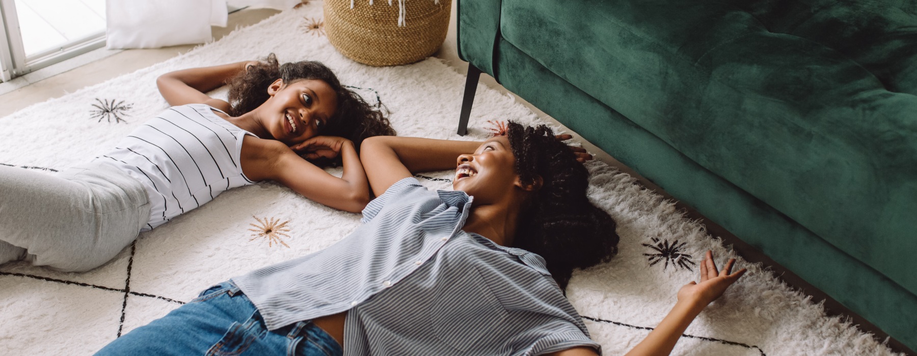 Mother and daughter in living room
