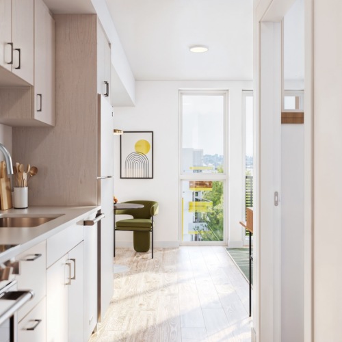 a kitchen with white cabinets